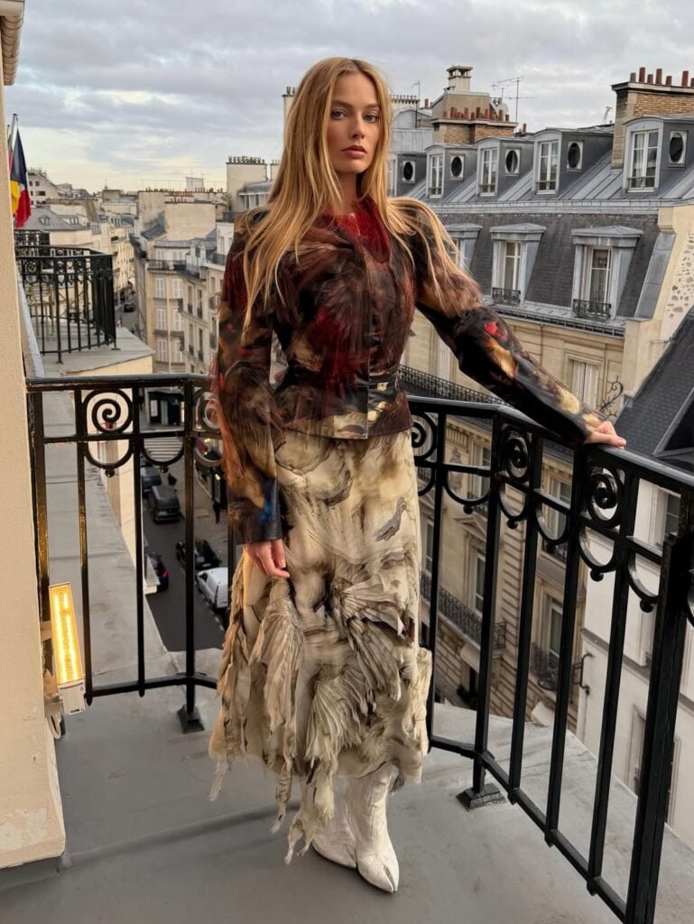 Margot Robbie Wore Maison Margiela Artisanal Promoting 'Wuthering Heights' In Paris, Margot Robbie Paris appearance, Margot Robbie Wuthering Heights press tour, Maison Margiela Artisanal 2025, Glenn Martens Maison Margiela, Wuthering Heights fashion press, Paris celebrity style, Margot Robbie Instagram fashion, Maison Margiela boots, Wuthering Heights film promotion, Paris press tour fashion