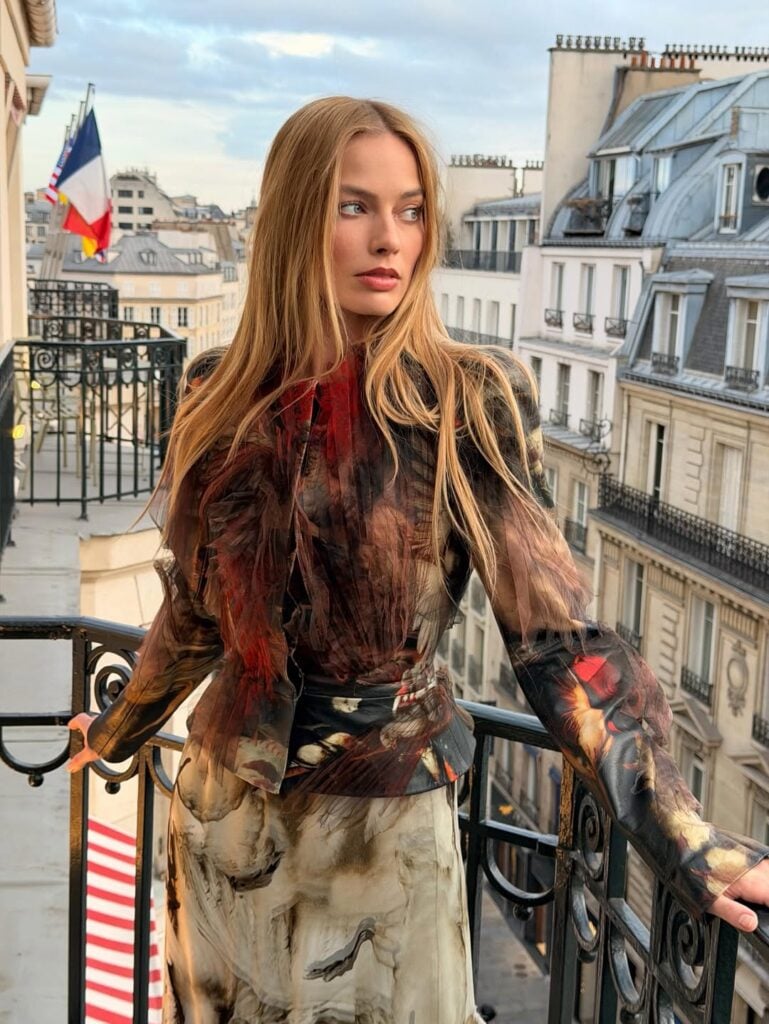 Margot Robbie Paris appearance, Margot Robbie Wuthering Heights press tour, Maison Margiela Artisanal 2025, Glenn Martens Maison Margiela, Wuthering Heights fashion press, Paris celebrity style, Margot Robbie Instagram fashion, Maison Margiela boots, Wuthering Heights film promotion, Paris press tour fashion