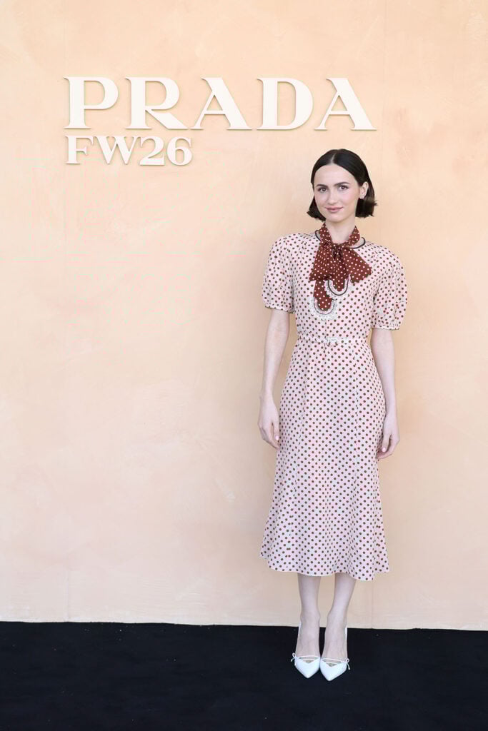 Maude Apatow, Prada Fall 2026 Womenswear, polka dot dress, Prada front row Milan, Milan Fashion Week 2026, Maude Apatow style, retro fashion trend, Prada FW26 show, Fondazione Prada
