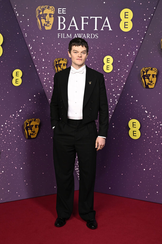 Robert Aramayo attends the EE BAFTA Film Awards 2026, Jonathan Anderson, Dior, 2026 BAFTA Film Awards, BAFTAs red carpet, Archie Madekwe, Odessa A'zion, EJAE, Little Simz, Robert Aramayo, Leonardo DiCaprio, Dior tailoring, Dior lace gown, Dior Pre-Fall 2026, celebrity menswear, red carpet fashion
