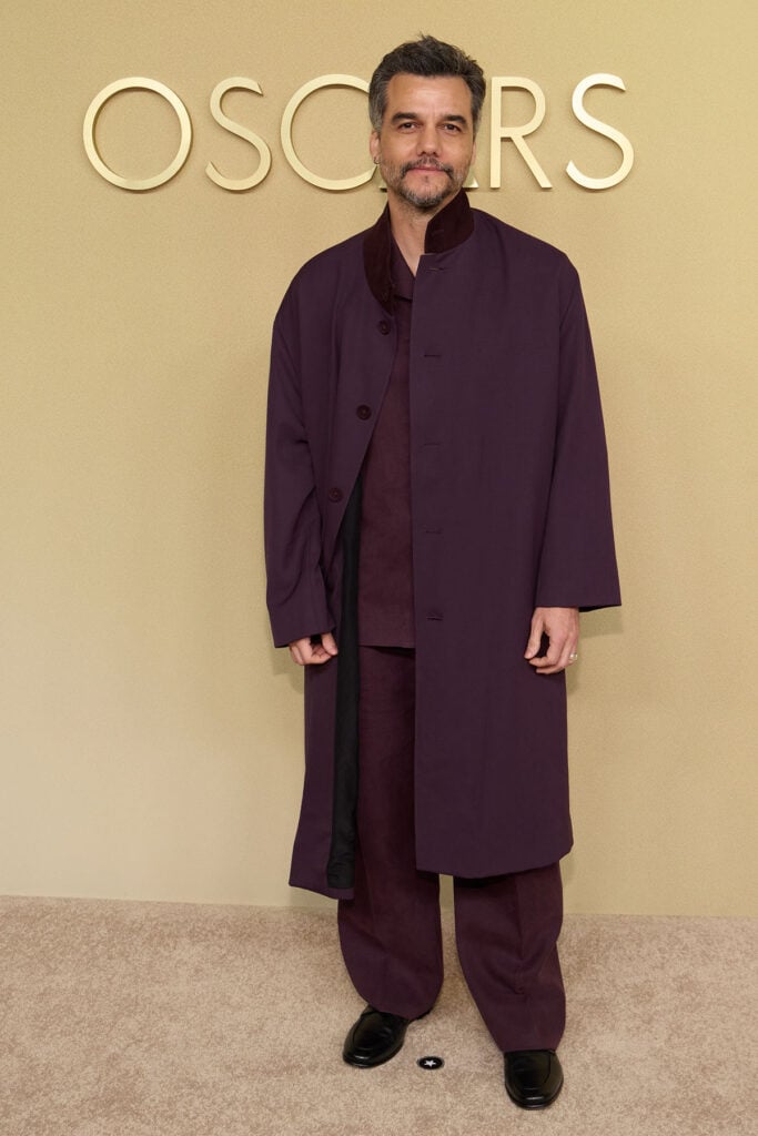 Wagner Moura, Zegna, Zegna Spring 2026, Wagner Moura Oscars, Oscar Nominees Luncheon 2026, berry overcoat, tonal tailoring, Zegna menswear, red carpet overcoat trend