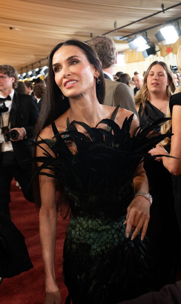 Demi Moore Wore Gucci To The 2026 Oscars, Demi Moore Oscars 2026, Demi Moore 2026 Oscars red carpet, Demi Moore Gucci Oscars, Gucci by Demna Oscars 2026, Demi Moore feather gown Oscars, Gucci Oscars red carpet, 2026 Oscars red carpet fashion, Demi Moore style Oscars, Gucci Demna Oscars gown