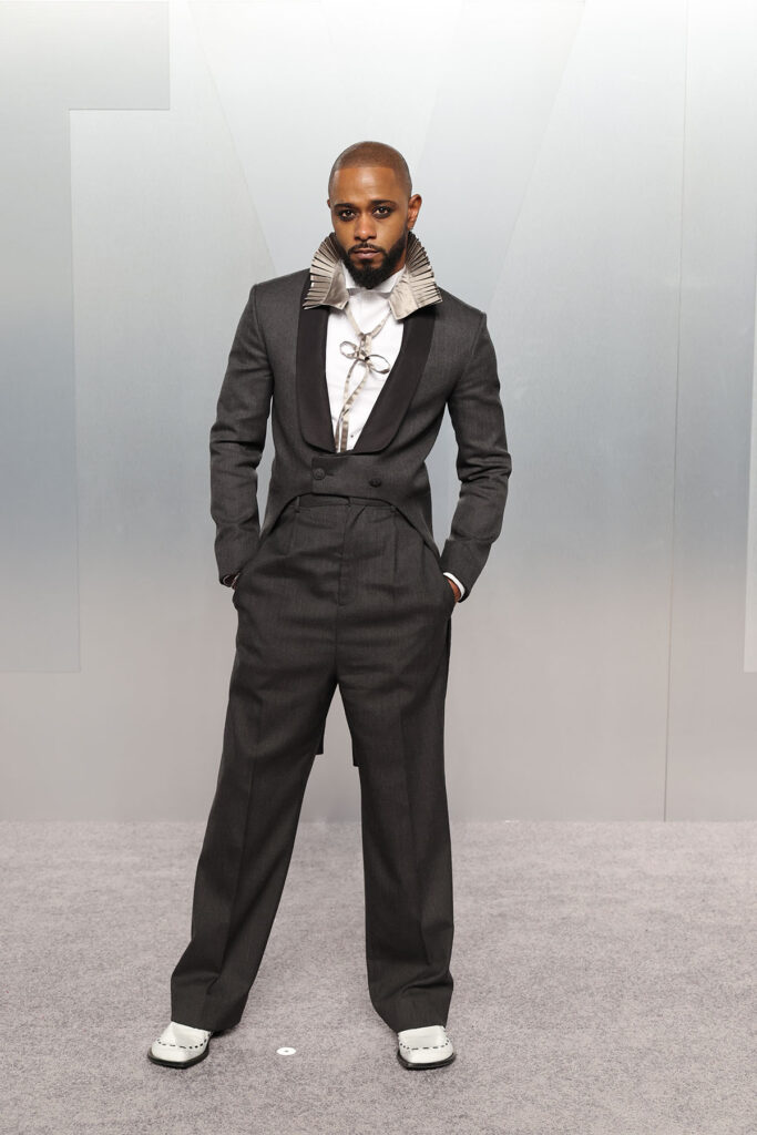 LaKeith Stanfield Vanity Fair Oscar Party 2026 Dior, LaKeith Stanfield Dior Winter 2026 tailcoat suit Vanity Fair Oscar Party, Vanity Fair Oscar Party 2026 red carpet LaKeith Stanfield, Dior Winter 2026 grey shawl collar suit LaKeith Stanfield