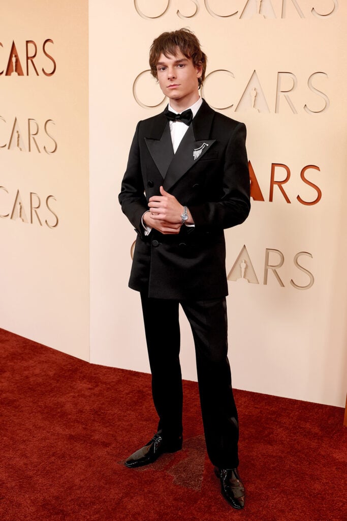 Mason Thames Oscars 2026, Mason Thames 2026 Oscars red carpet, Mason Thames Saint Laurent Oscars, Mason Thames Anthony Vaccarello Saint Laurent, Mason Thames Oscars menswear, Mason Thames velvet suit Oscars, Mason Thames Saint Laurent tuxedo, Mason Thames Garatti Jewelry brooch, Oscars 2026 red carpet Mason Thames, Saint Laurent Oscars Mason Thames