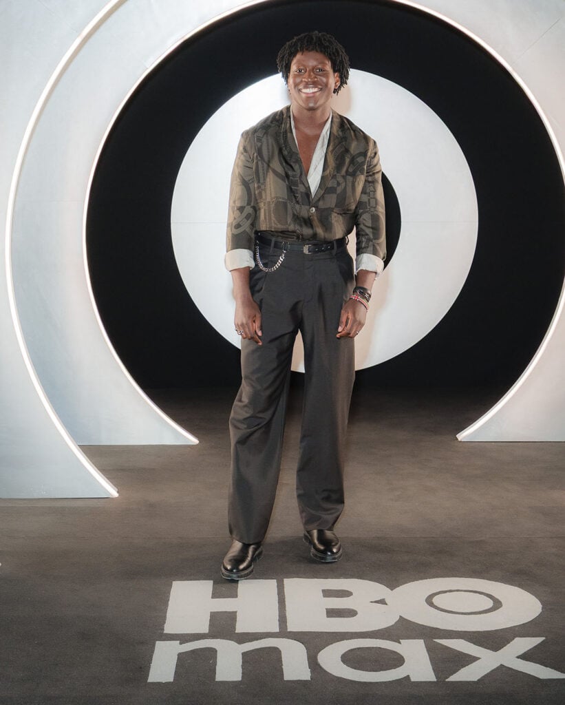 Toheeb Jimoh HBO Max UK Ireland launch party, Toheeb Jimoh HBO Max red carpet, HBO Max London launch menswear, Hermès Spring 2026 Toheeb Jimoh shirt, Toheeb Jimoh Hermès chain print shirt, Ted Lasso HBO Max event style, Hermès HBO Max launch London, Toheeb Jimoh red carpet menswear