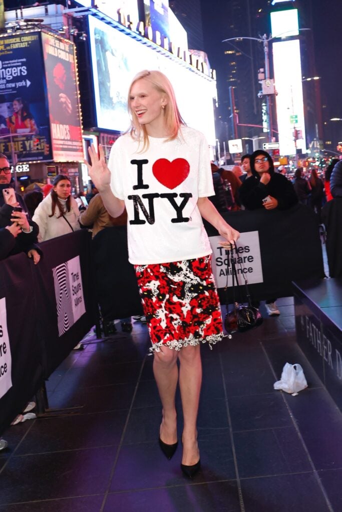 Alex Consani Times Square Midnight Moment, Alex Consani Chanel Pre-Fall 2026, Times Square Arts Midnight Moment fashion, Tomokazu Matsuyama Alex Consani, Chanel Pre-Fall 2026 Times Square, Alex Consani NYC art event, Times Square digital art installation fashion