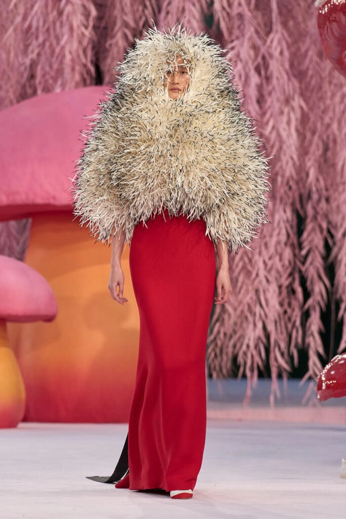 Chanel Spring 2026 Haute Couture runway look with feathered embroidered cape detail by Matthieu Blazy