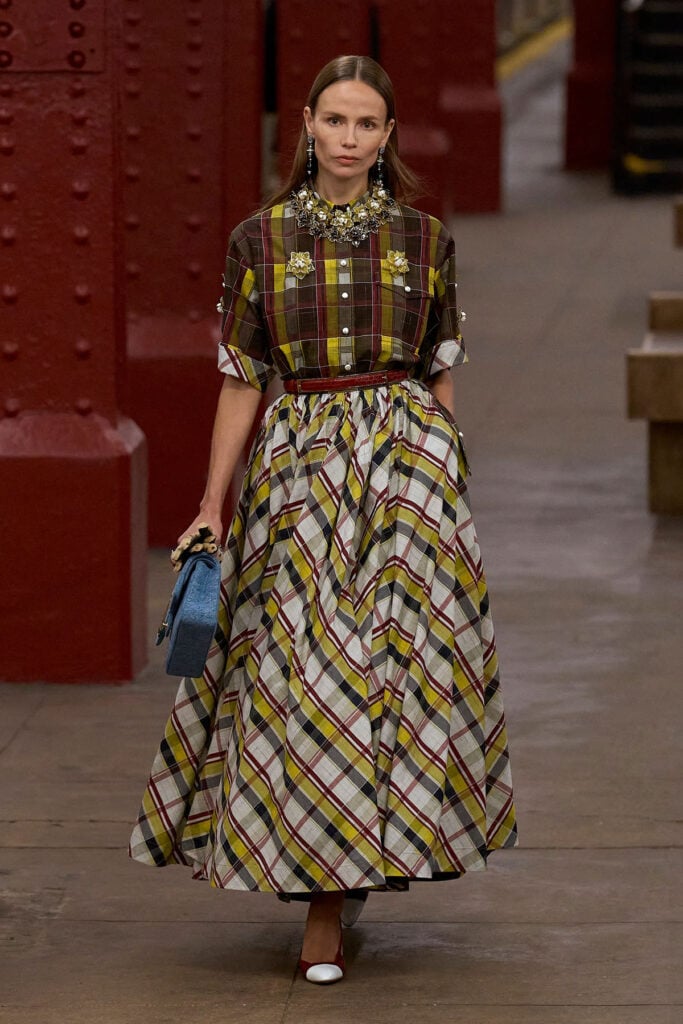 Chanel Pre-Fall 2026 checked blouse and full skirt runway look designed by Matthieu Blazy