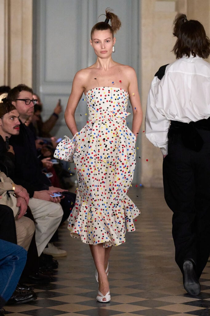 Jacquemus Fall 2026 ivory strapless polka dot appliqué dress on the runway