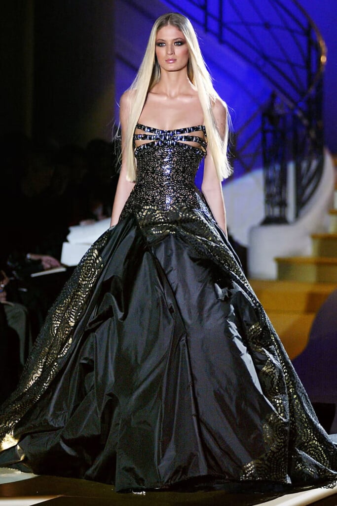 Jennifer Lopez wore an Atelier Versace Spring 2004 archival gown on the runway reference image.