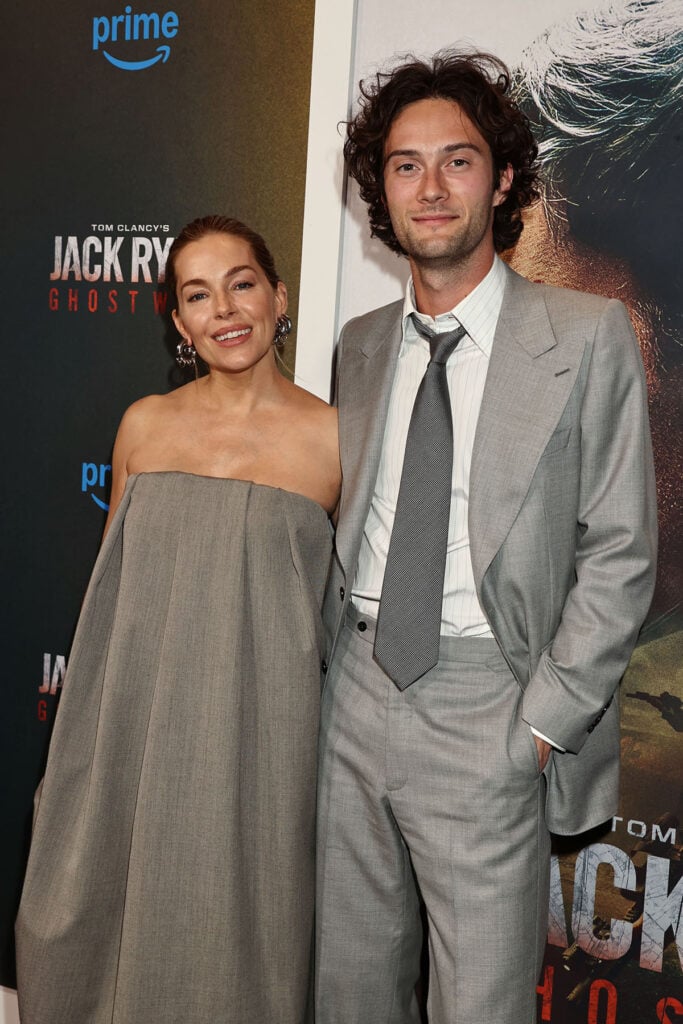 Sienna Miller and Oli Green attended the ‘Jack Ryan: Ghost War’ New York premiere in coordinated black-and-white eveningwear.