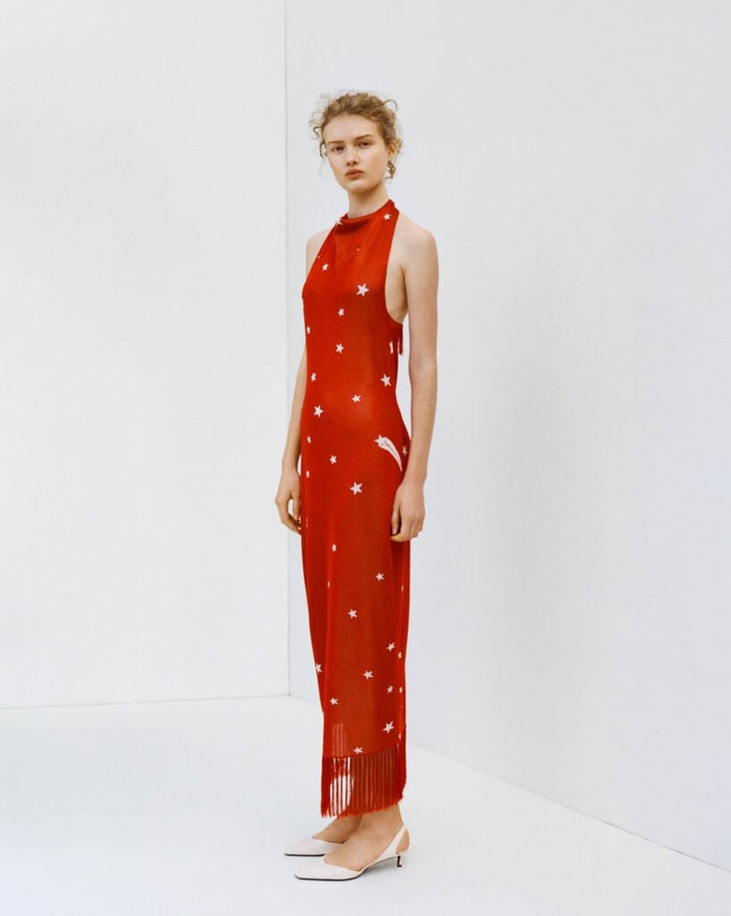 High Sport Fall 2026 red halter dress with white star print shown in the runway reference image.