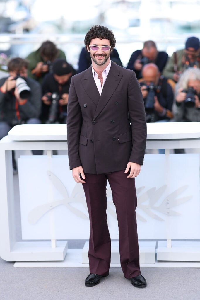 Jordan Firstman wearing Prada at the Club Kid photocall during Cannes Film Festival