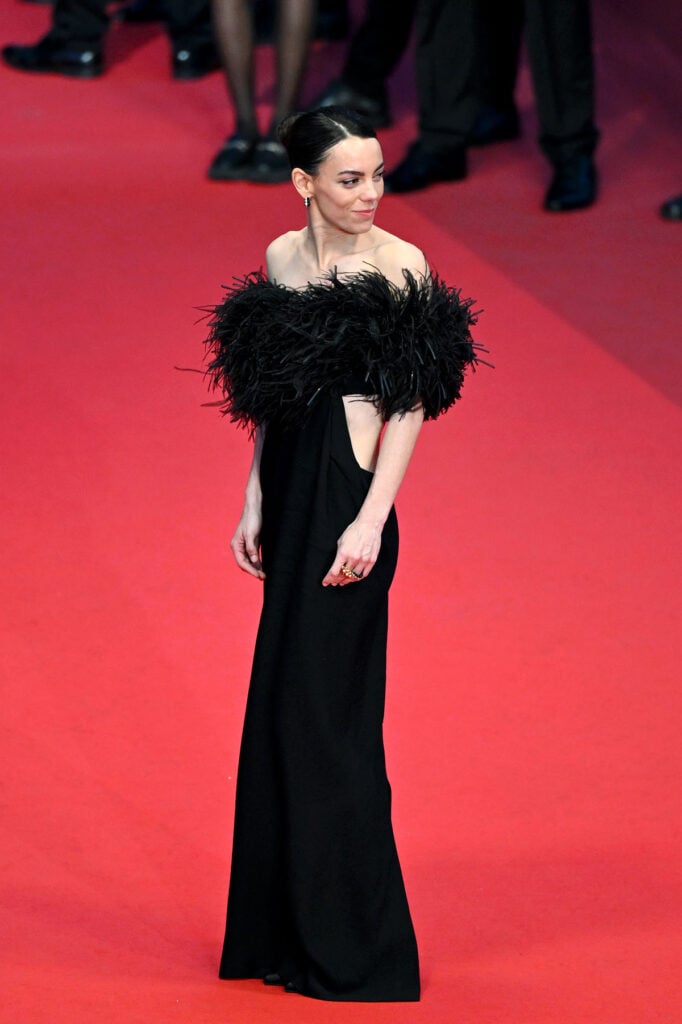 Vicky Luengo wore a custom Loewe gown with a feathered neckline to the El Ser Querido Cannes premiere.