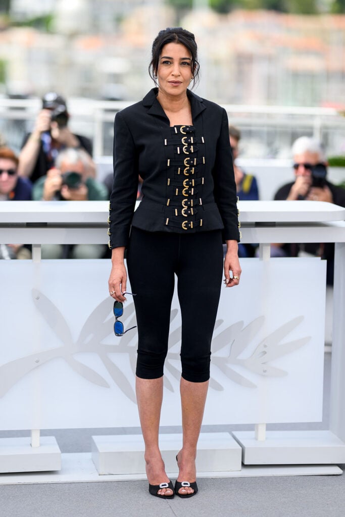 Leïla Bekhti wears a Versace Fall 1992 Bondage collection jacket at the Un Certain Regard jury photocall in Cannes.
