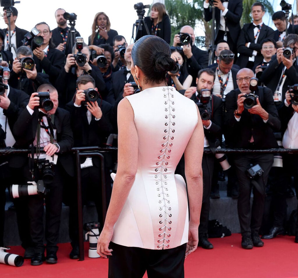 Leïla Bekhti the back of vSchiaparelli Haute Couture at the La Vie D’Une Femme Cannes Film Festival premiere in France.