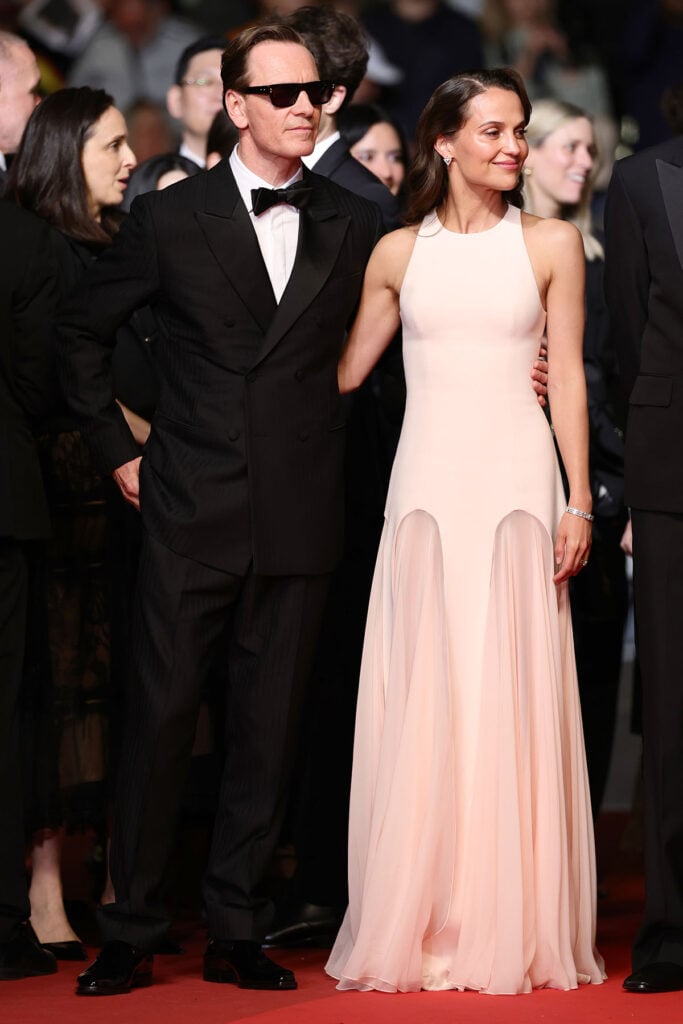 Michael Fassbender wearing a black double-breasted tuxedo at the ‘Hope’ Cannes Film Festival premiere
Alicia Vikander wearing Louis Vuitton at the ‘Hope’ premiere during the Cannes Film Festival