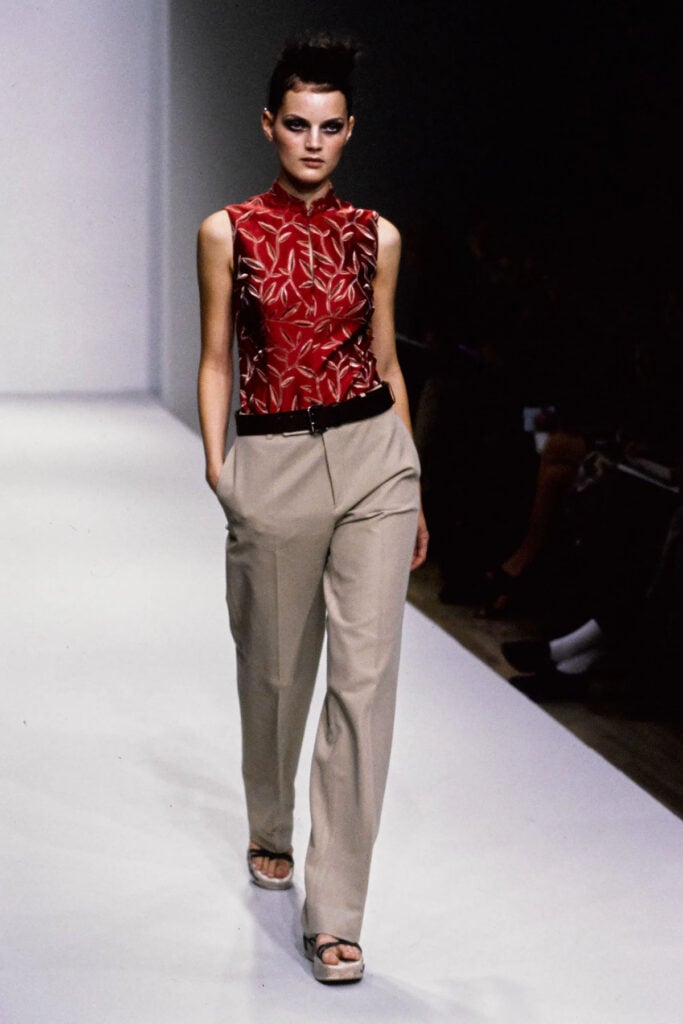 Prada Spring 1997 runway look featuring the red silk jacquard foliage motif later revisited on Carey Mulligan.