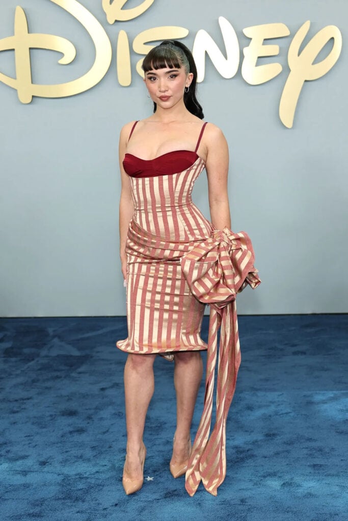 Rowan Blanchard wearing Ellie Misner striped corset dress at the 2026 Disney Upfront
