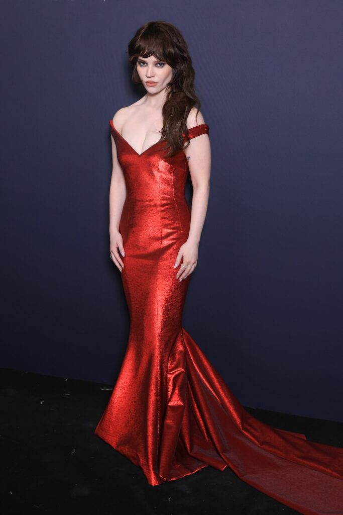 Sophie Thatcher wore a ruby red sequinned Gucci gown to the Kering Women In Motion dinner while promoting Her Private Hell in Cannes.