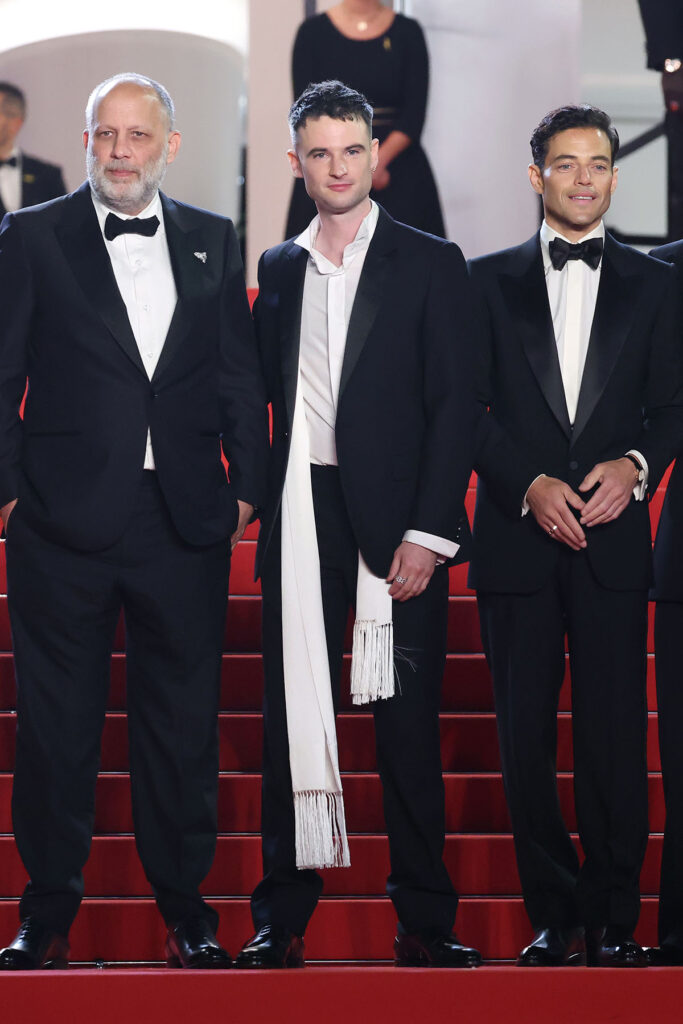 Tom Sturridge wore a Dior tuxedo with a white silk scarf at The Man I Love Cannes premiere.