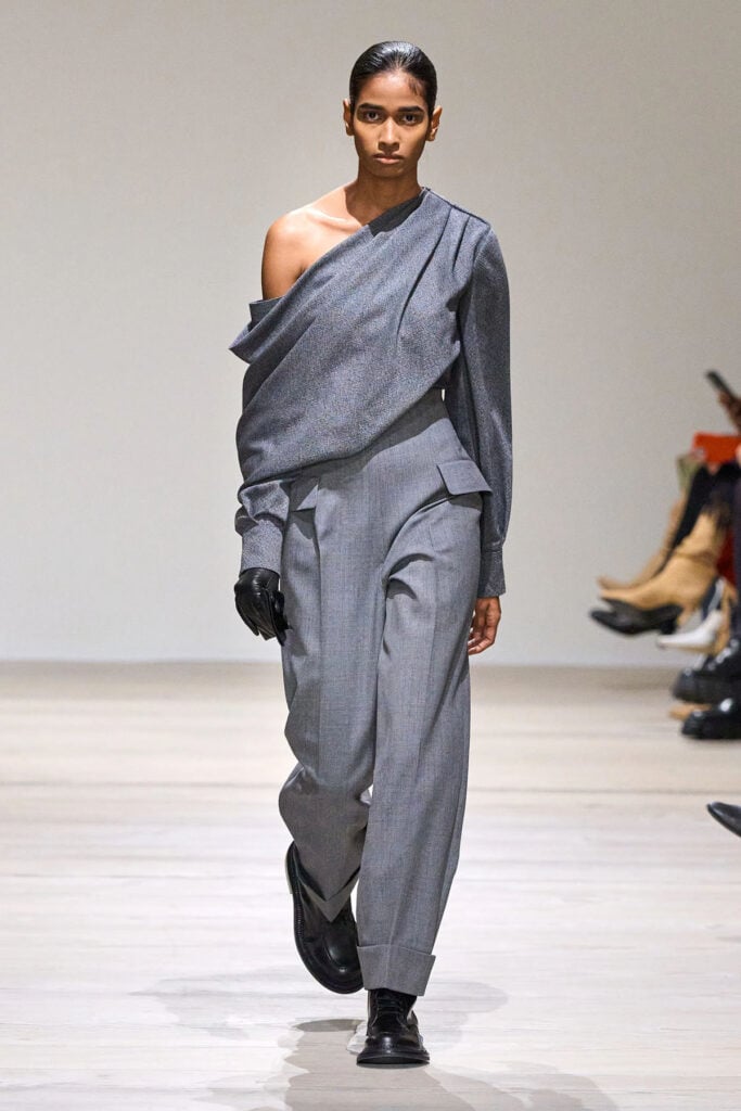 Emilia Wickstead Fall 2025 runway look featuring the Alida draped top and Eimear wide-leg trousers.