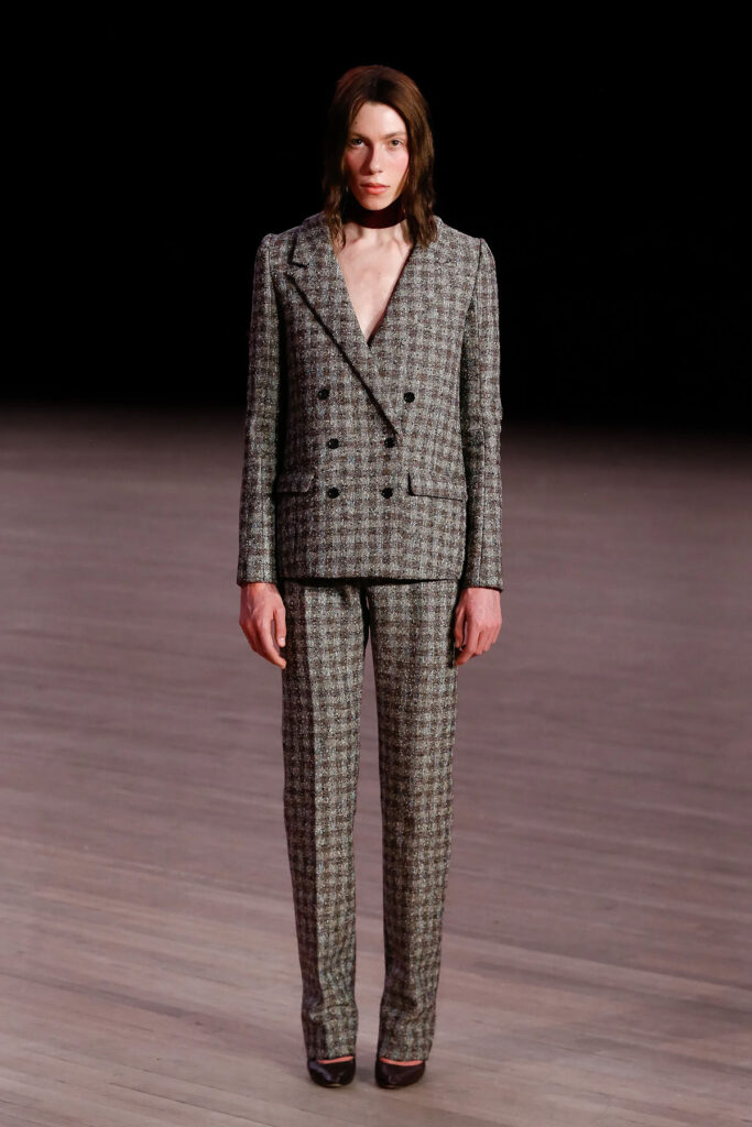 Model wearing Marc Jacobs Spring 2026 checked suit on the runway