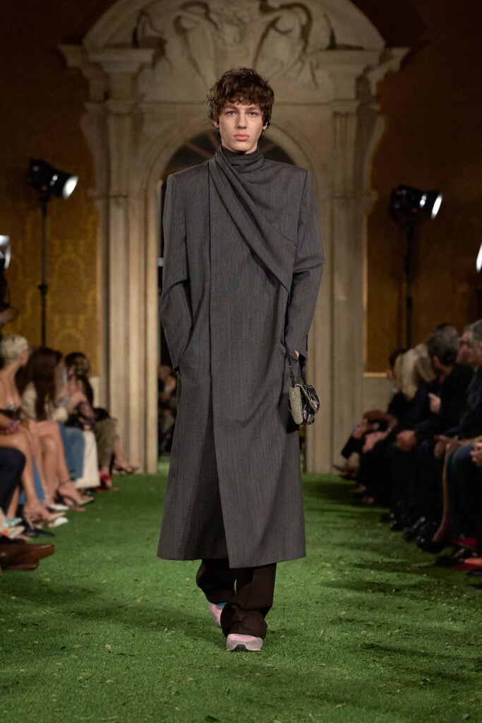 Valentino Fall 2026 grey draped overcoat and wide-leg trousers on the runway