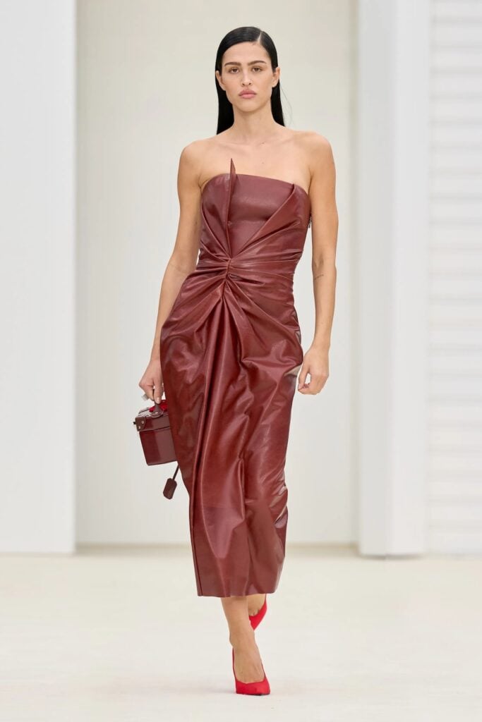 Ferrari runway leather dress styled with contrasting accessories.