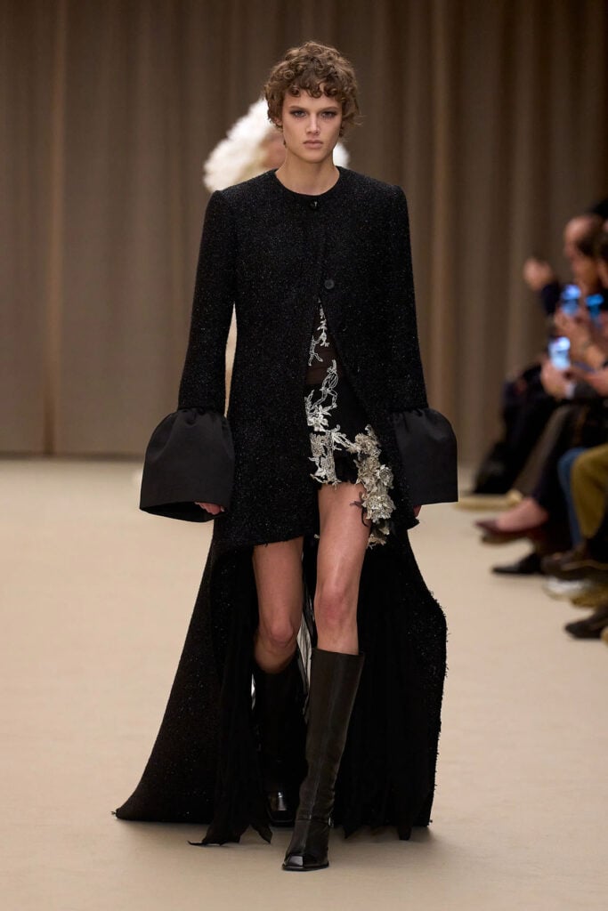 McQueen Fall 2026 opera coat and metallic embroidered mini dress on the runway
