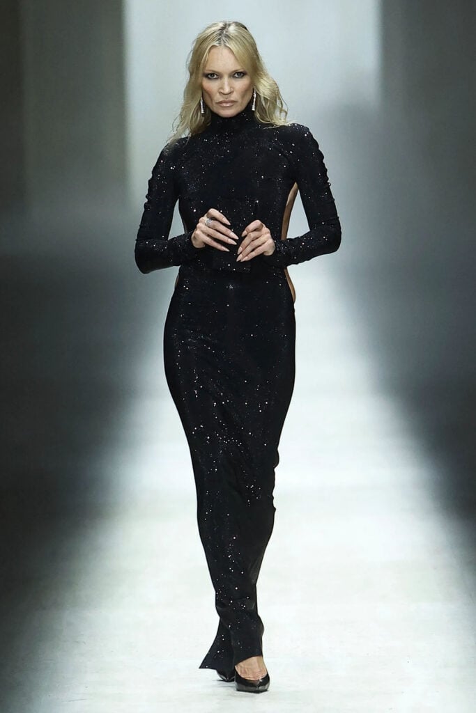 Kate Moss walks the Gucci Fall 2026 runway wearing the black Gucci Primavera dress
