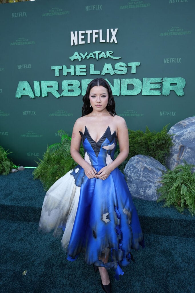Elizabeth Yu wears a blue Moschino gown to the Avatar: The Last Airbender Season 2 premiere in Los Angeles.