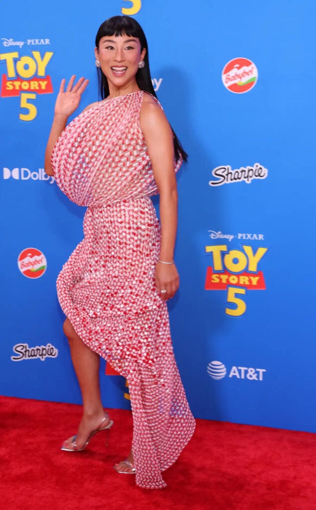 Greta Lee side profile of Dior Spring 2026 Haute Couture dress at the Toy Story 5 premiere in Los Angeles