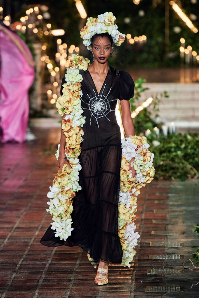 Rodarte Fall 2020 black chiffon spiderweb dress with crystal spider detail on the runway