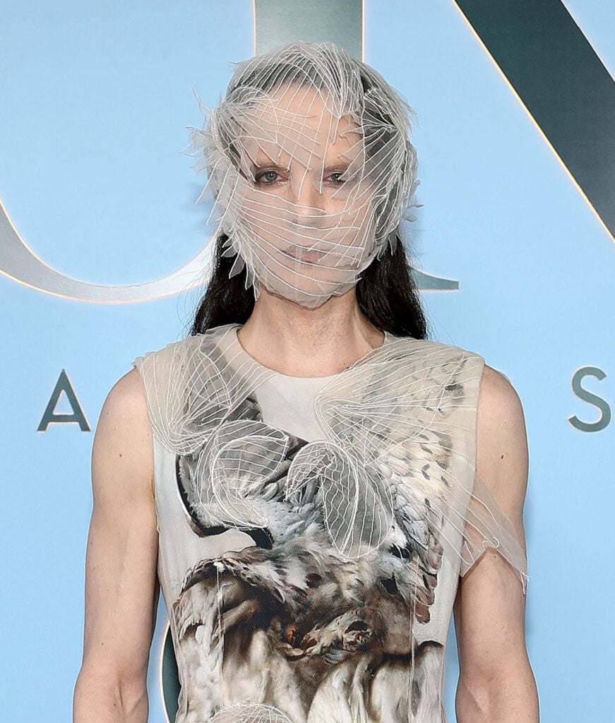Jordan Roth showcases a tulle illusion mask and winged detailing from his Maison Margiela Artisanal look.