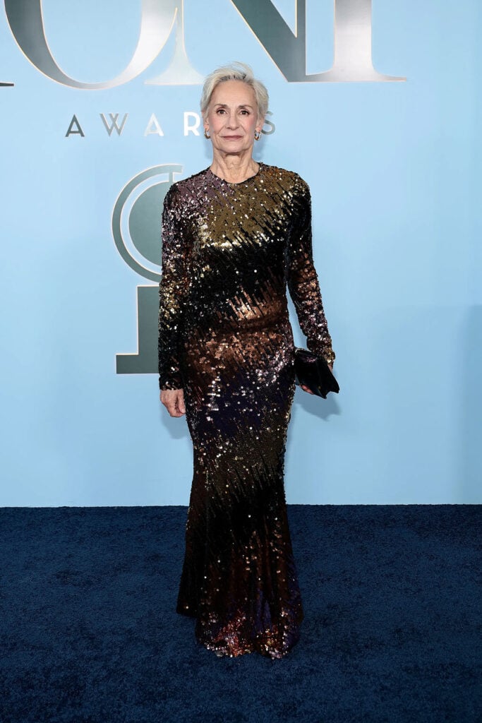Laurie Metcalf wears a custom Christian Siriano ombré sequin gown at the 2026 Tony Awards.
