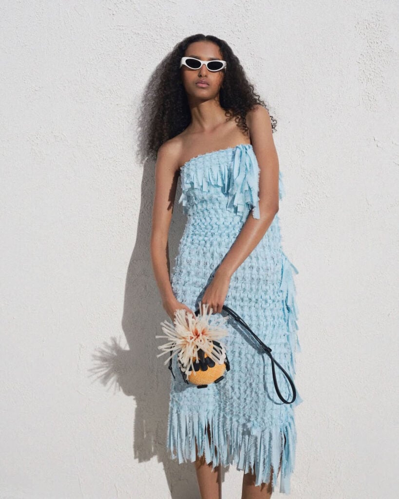 Loewe x Paula Ibiza Spring 2026 powder-blue fringed strapless dress from the collection look book