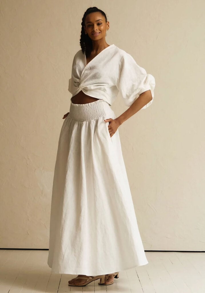 Nothing Fits But white linen top and smocked maxi skirt featured in Anne Hathaway's pregnancy announcement