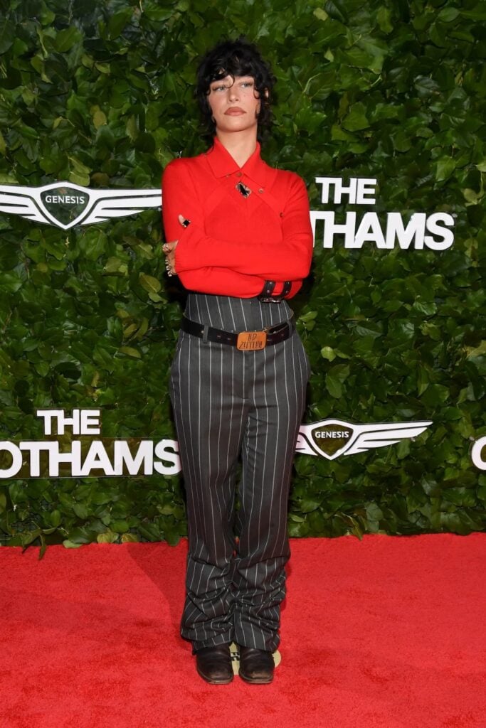 Odessa A'zion wearing a pinstriped jumpsuit at the 2026 Gotham Awards in New York City