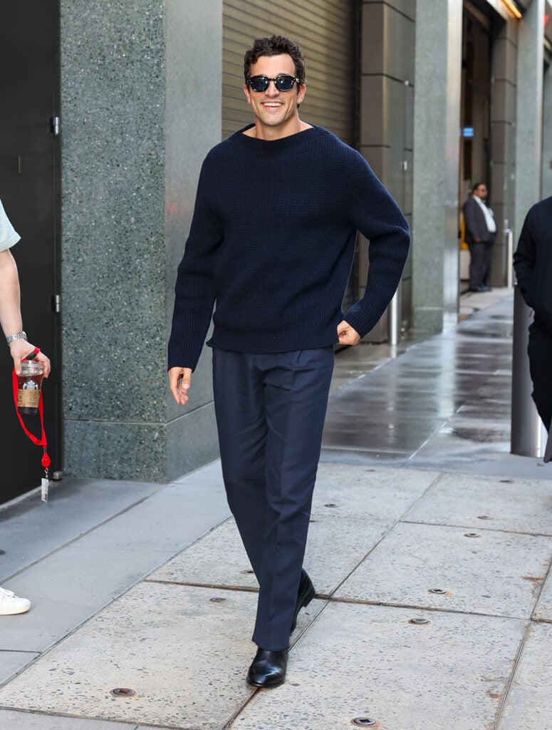 Paul Anthony Kelly wears Ferragamo at the Love Story Emmy FYC press junket.