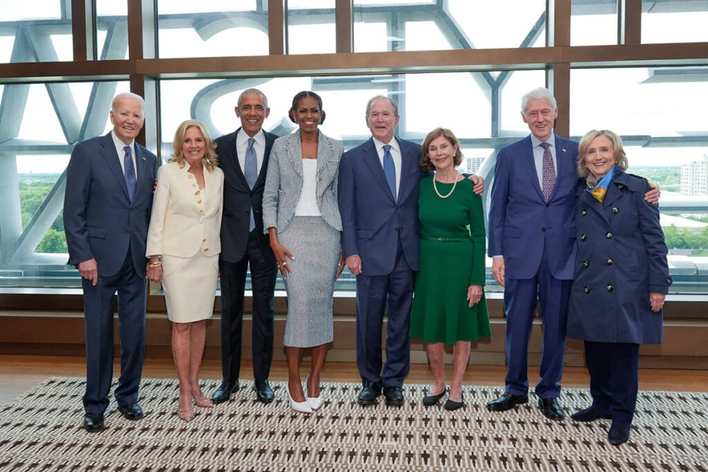 Former President Joe Biden, former first lady Jill Biden, former President Barack Obama, former first lady Michelle Obama, former President George W. Bush, former first lady Laura Bush, former President Bill Clinton and former Secretary of State Hillary Clinton, pose for a photo ahead of the dedication ceremony at the Obama Presidential Center