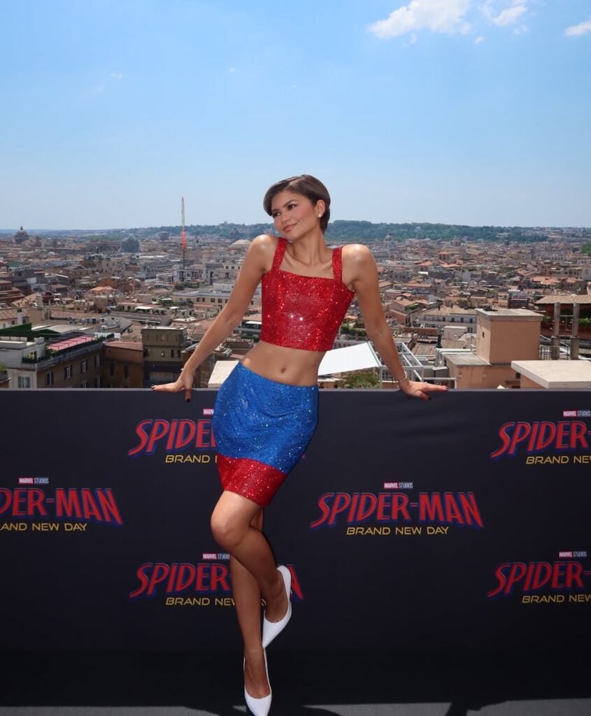 Zendaya wearing white Christian Louboutin So Kate pumps with her Gianni Versace look in Rome.