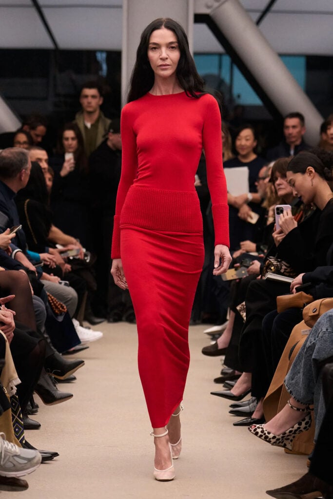 Alaïa Fall 2026 red knit dress shown on the runway.