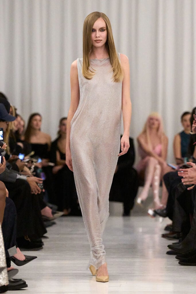 Christian Cowan Fall 2026 silver mesh column dress on the runway.