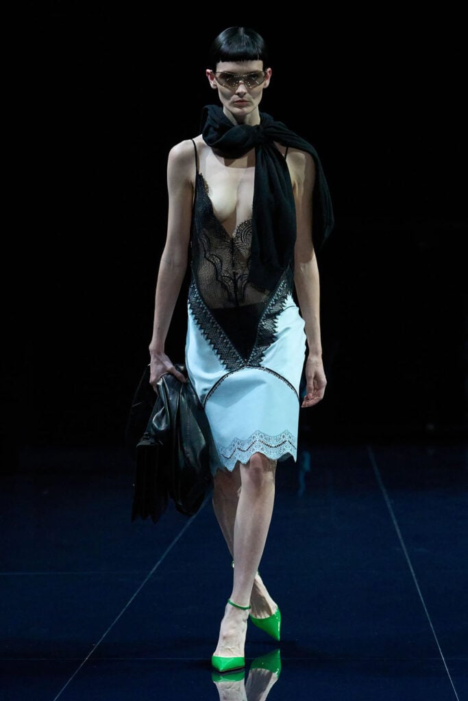 Tom Ford Spring 2026 pale blue and black lace slip dress on the runway.