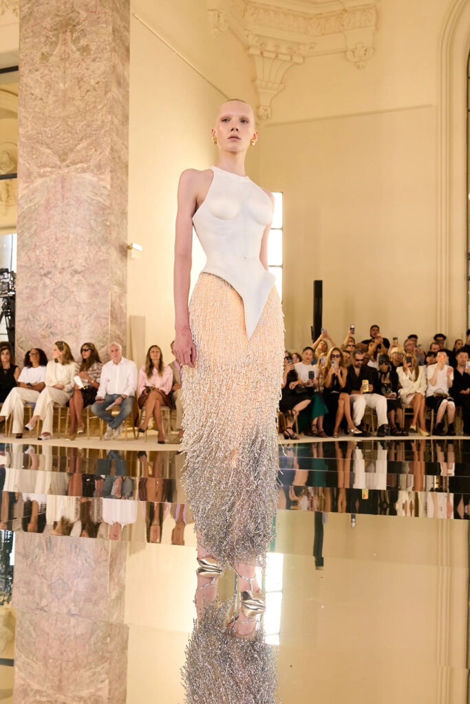 Model presents the Schiaparelli Fall 2026 Haute Couture look during Paris Haute Couture Fashion Week.
