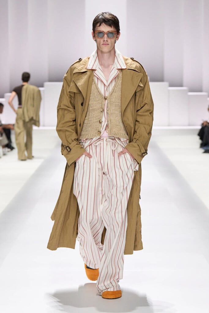 Dolce & Gabbana Spring 2026 menswear runway look featuring the striped pyjama-inspired trousers worn by Erling Haaland.
