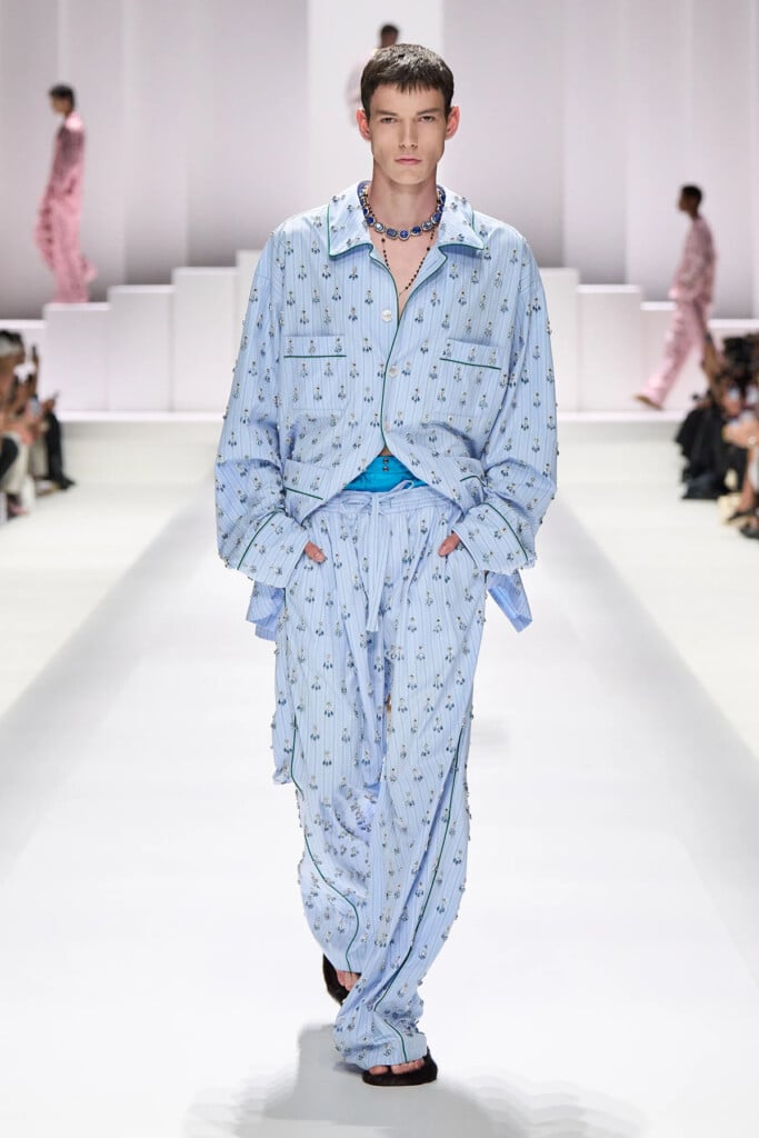 Dolce & Gabbana Spring 2026 menswear runway look featuring the striped pyjama-inspired trousers worn by Erling Haaland.