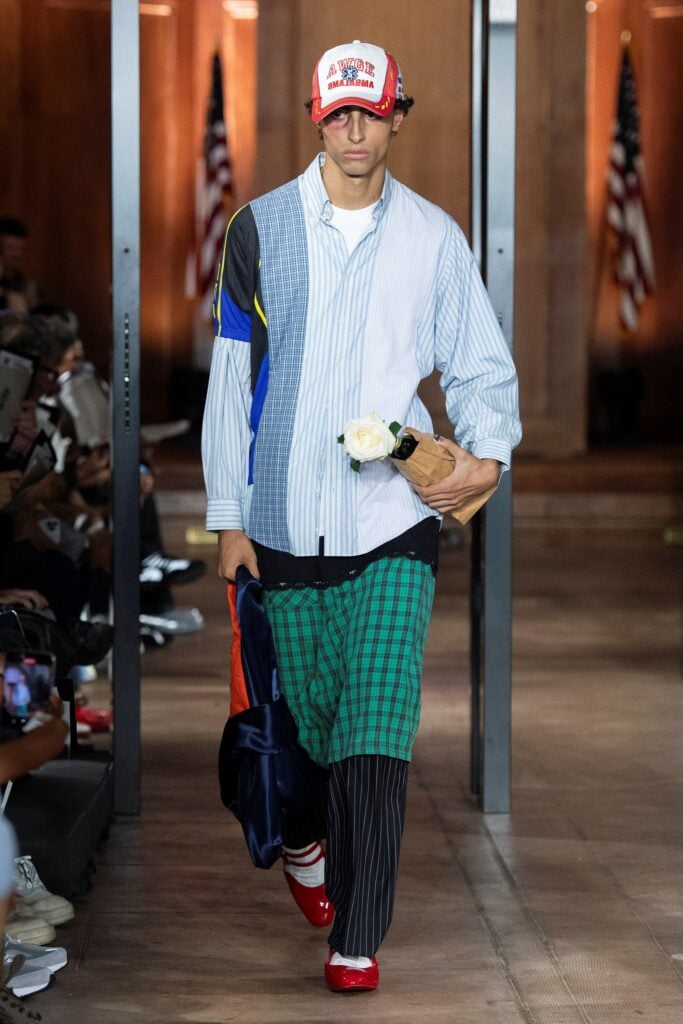 AWGE runway look featuring the patchwork shirt and Bermuda shorts worn by A$AP Rocky.