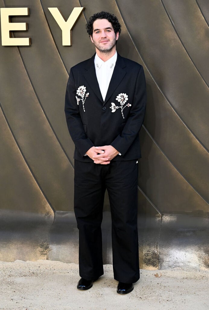 Benny Safdie wearing a Simone Rocha embellished suit at The Odyssey world premiere in London